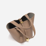 GABRIELA™ – MALA TIPO BUCKET COM FECHO DOURADO E DESIGN ELEGANTE